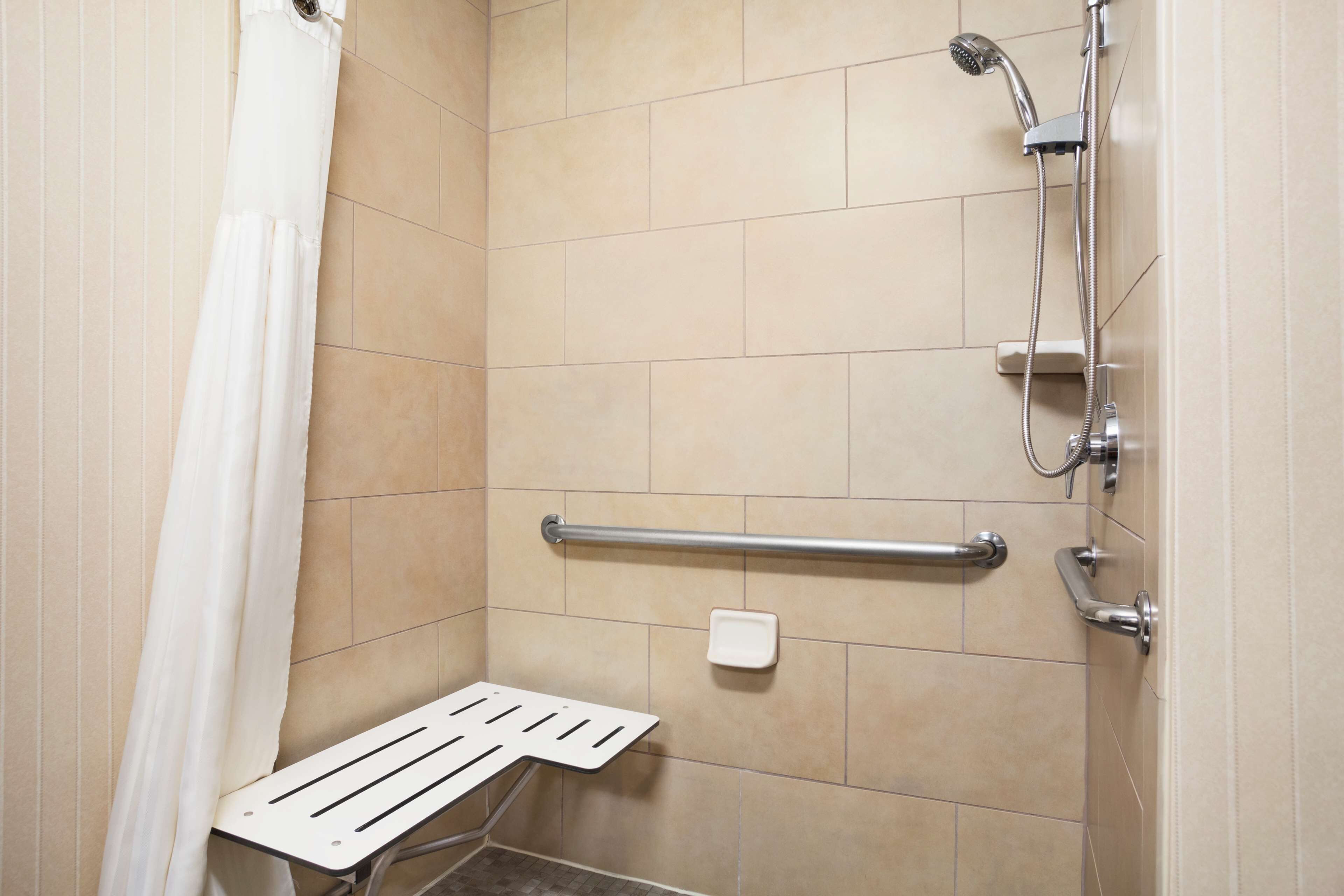 combined shower/bathtub, eco-friendly toiletries, hair dryer, bathrobes