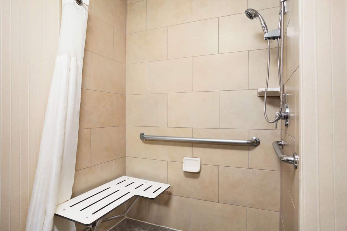 combined shower/bathtub, eco-friendly toiletries, hair dryer, bathrobes