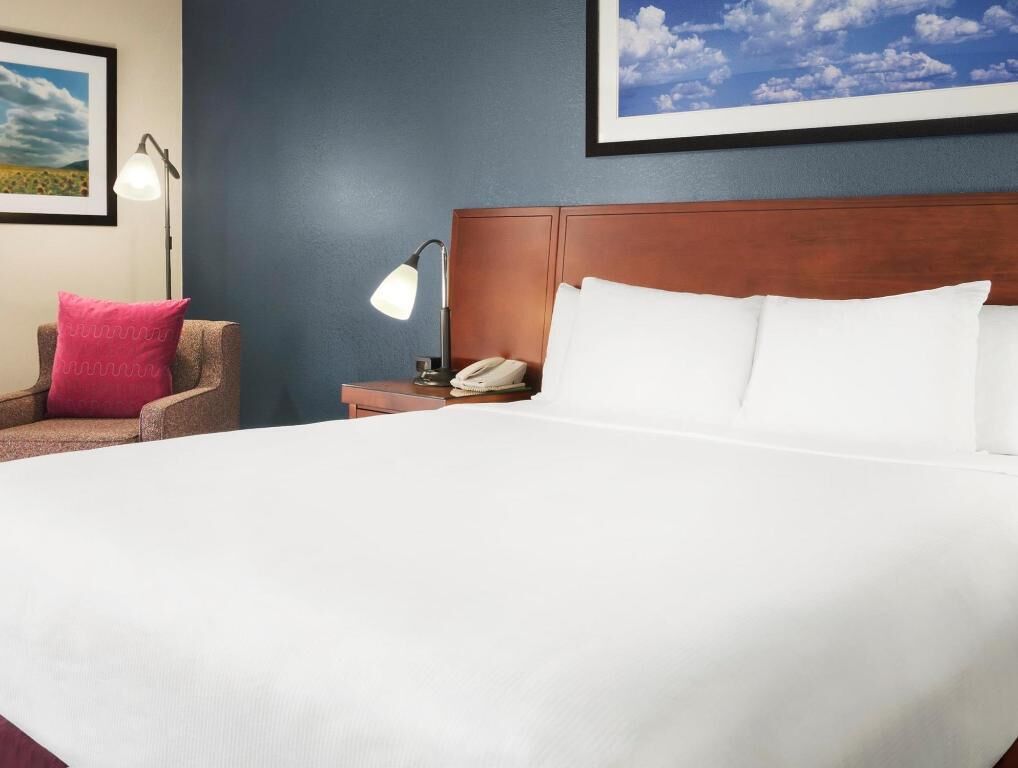 Premium bedding, down duvets, in-room safe, desk