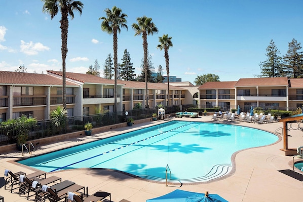 Outdoor pool, open 6:00 AM to 10:00 PM, pool umbrellas, sun loungers