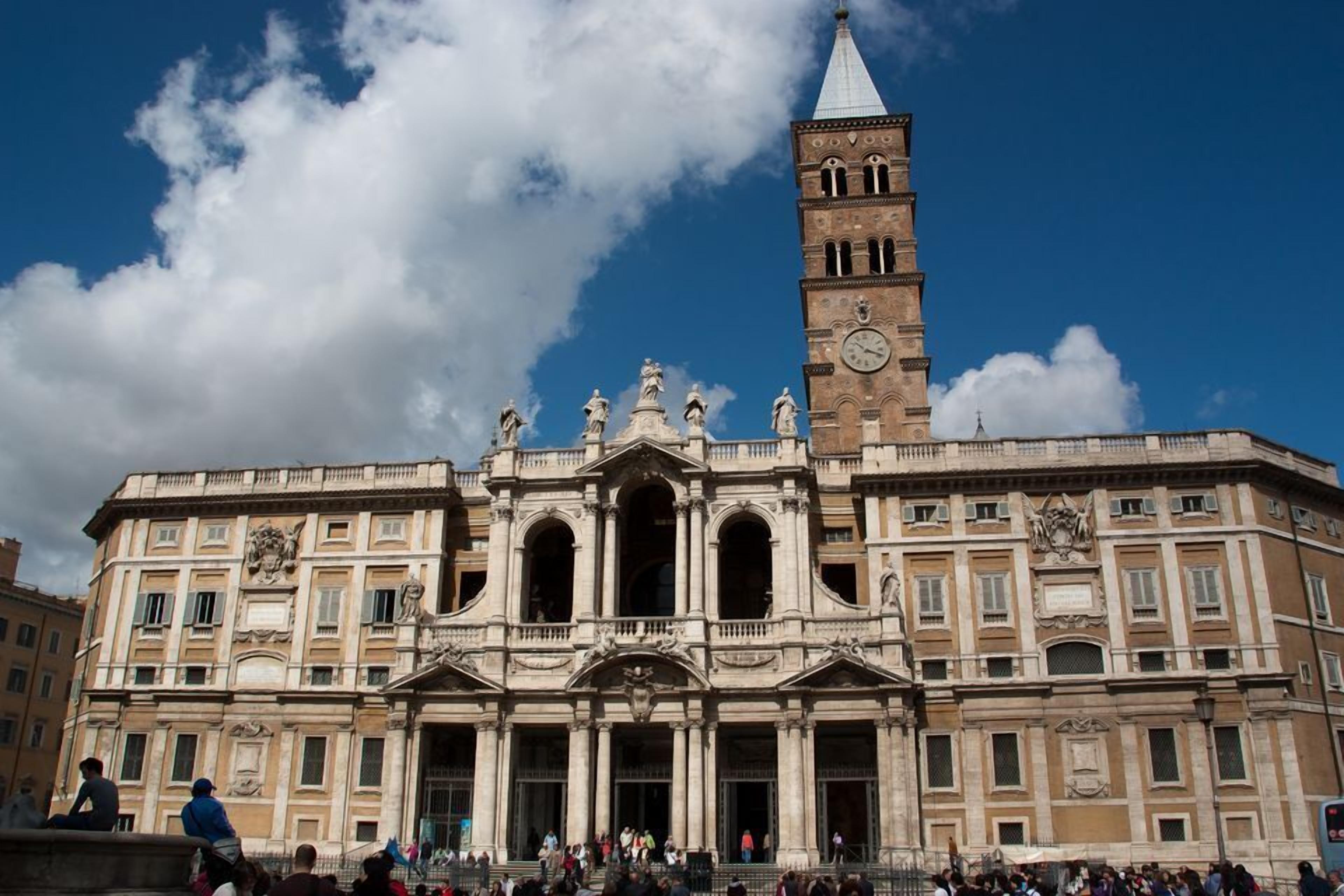 A historic building with a prominent clock tower and classical architecture.