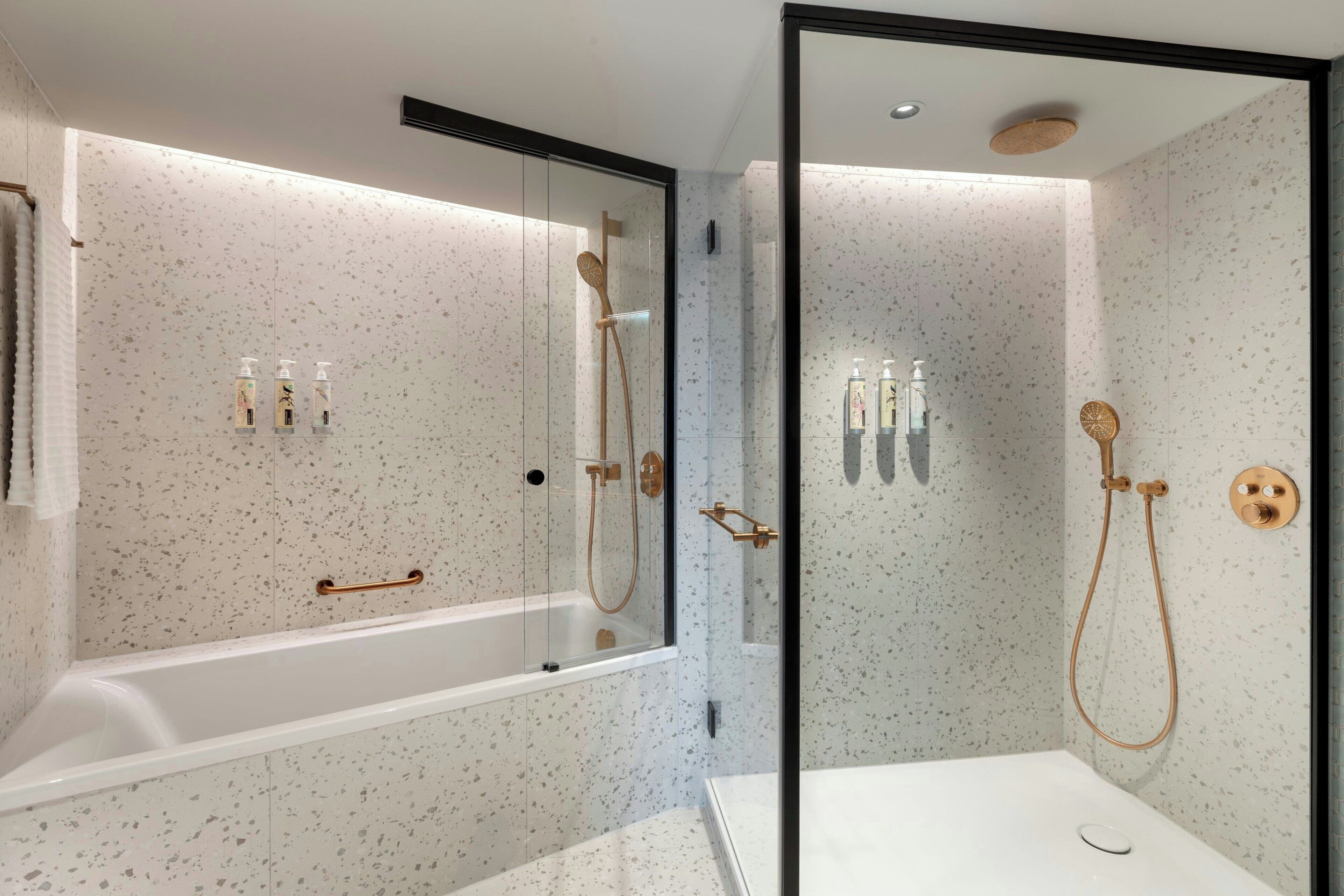 combined shower/bathtub, eco-friendly toiletries, hair dryer, towels