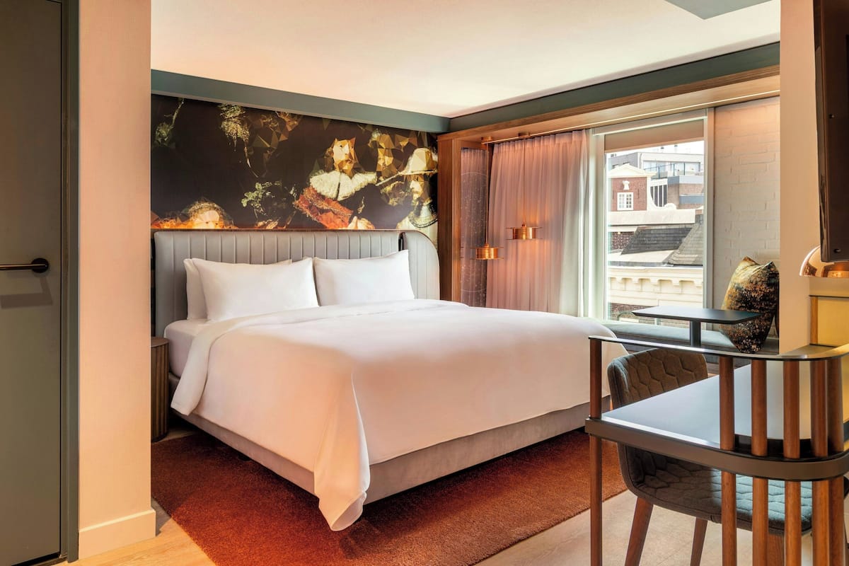 Deluxe Room, 1 King Bed | 1 bedroom, premium bedding, pillowtop beds, in-room safe