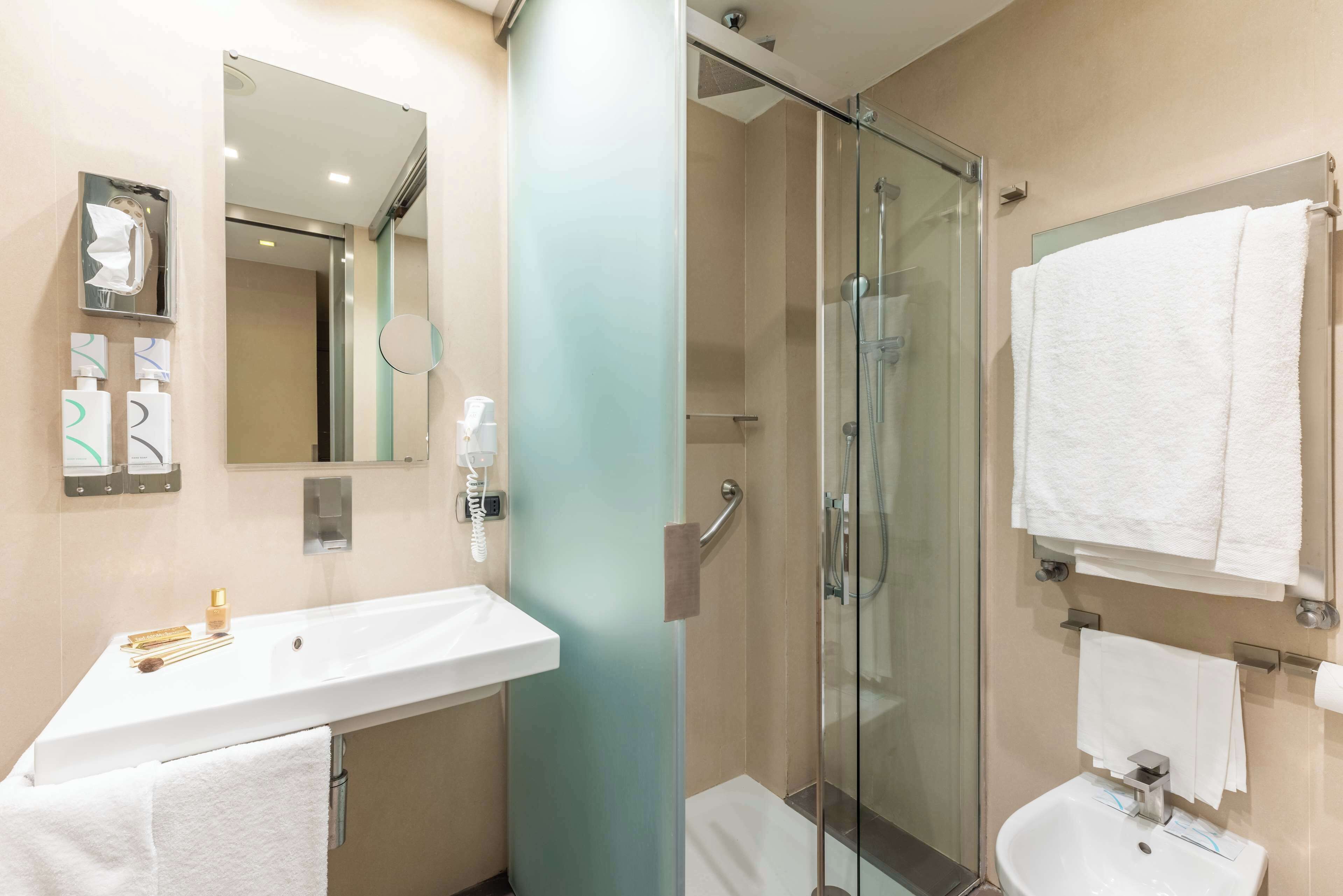 comfort room, multiple beds | bathroom | shower, eco-friendly toiletries, hair dryer, bathrobes