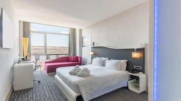 Deluxe Room, 1 King Bed | Premium bedding, minibar, in-room safe, desk