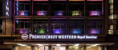 A hotel with a sign reading "Premier Best Western Royal Santina."