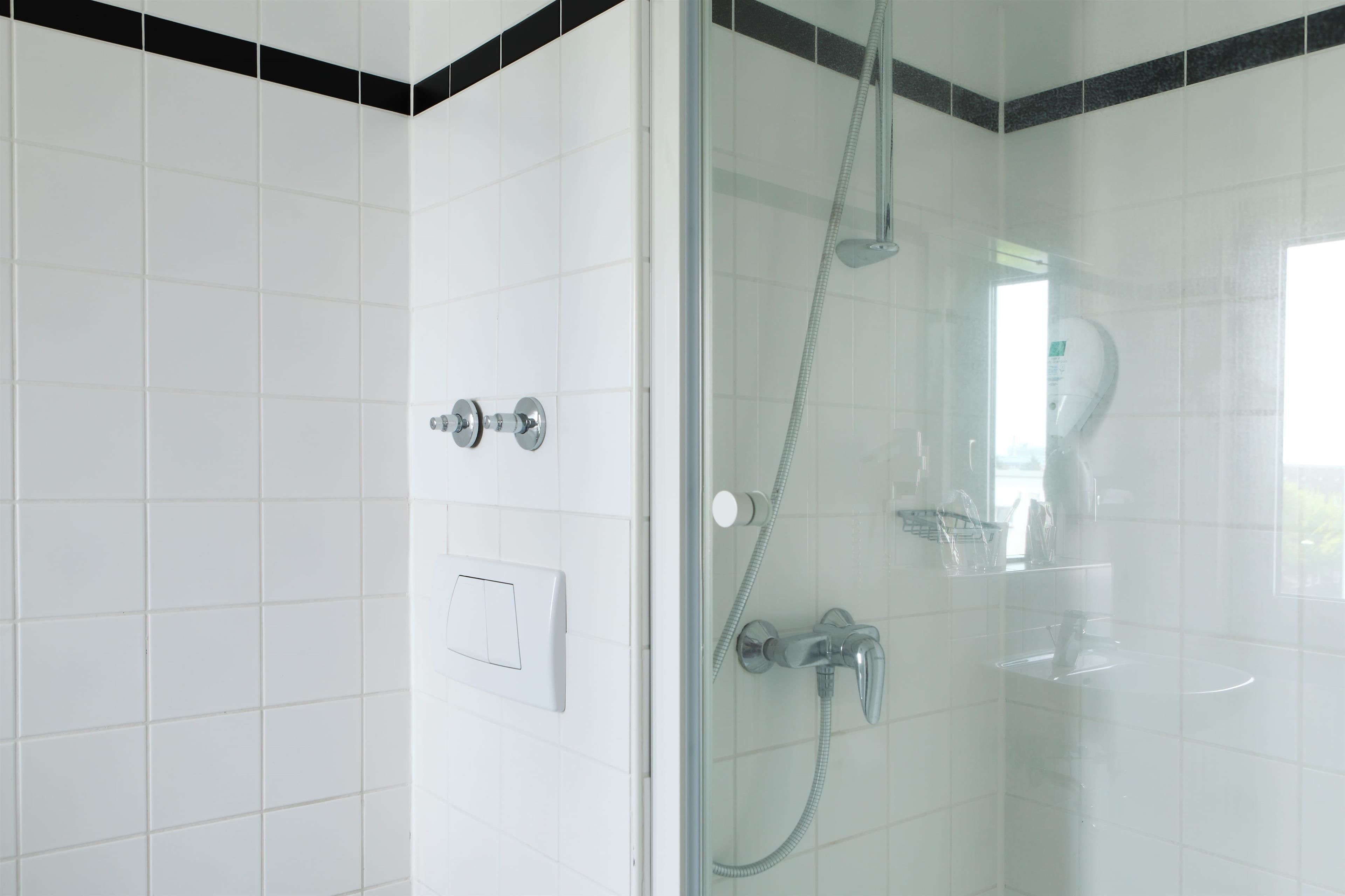 shower, eco-friendly toiletries, hair dryer, towels