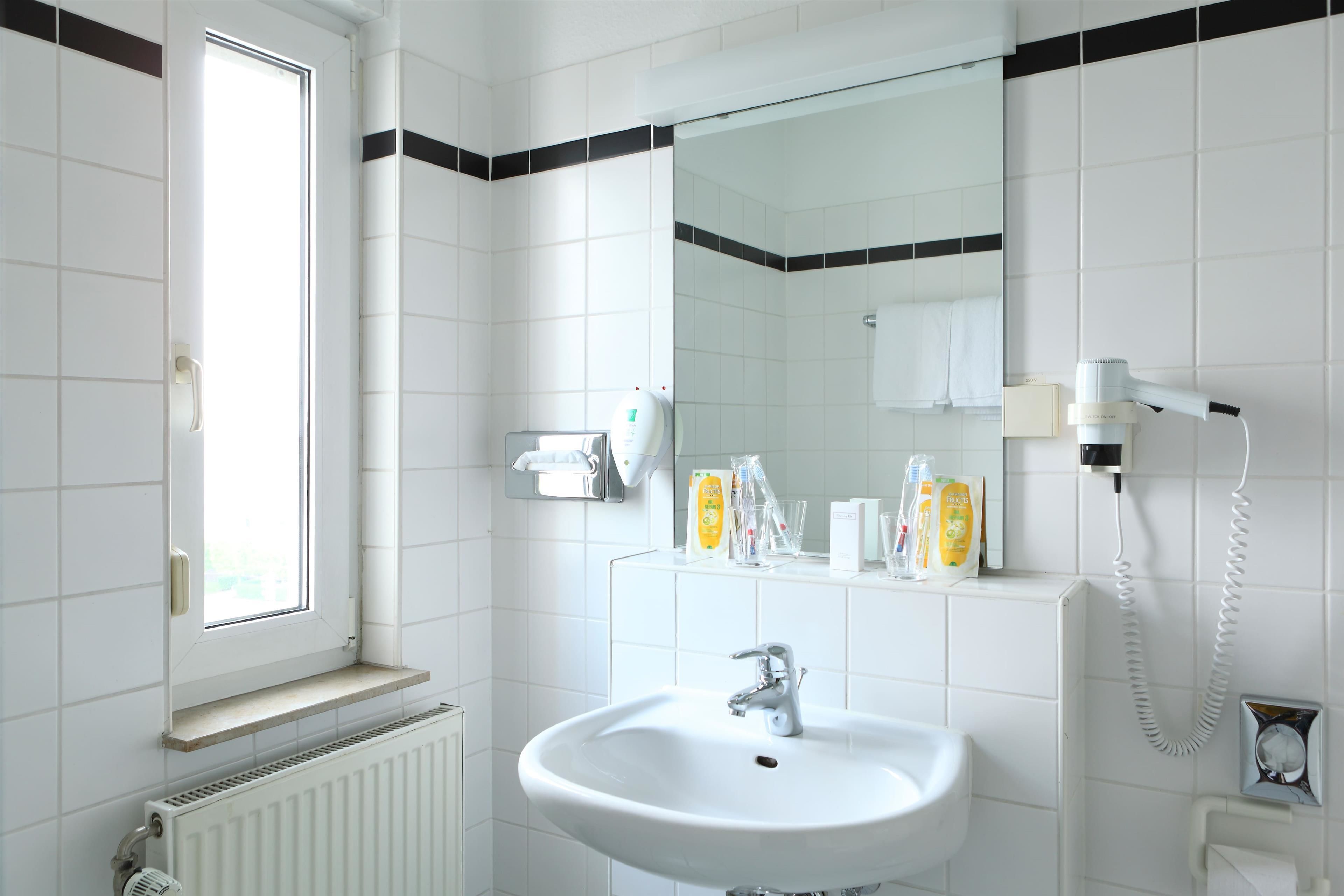 shower, eco-friendly toiletries, hair dryer, towels