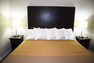 Room, 1 King Bed, Non Smoking | 1 bedroom, in-room safe, desk, iron/ironing board