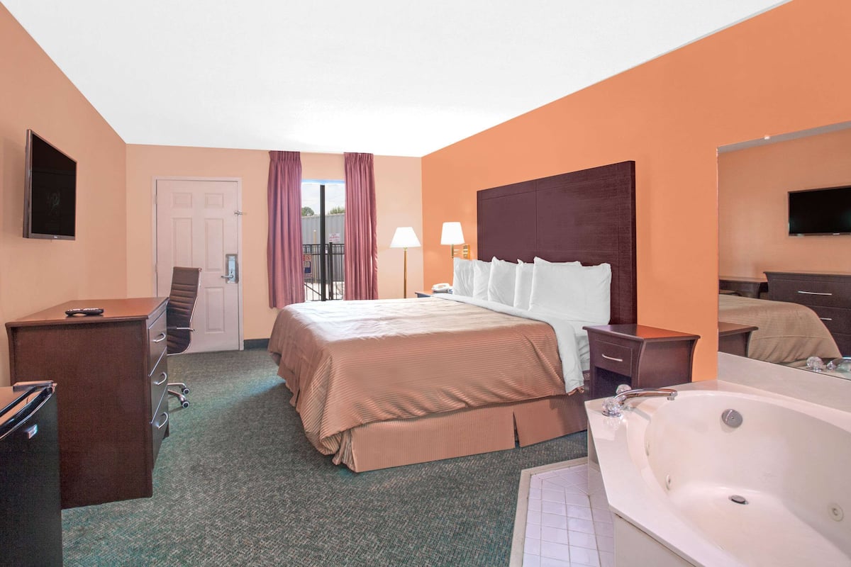 Suite, 1 King Bed, Non Smoking | In-room safe, desk, iron/ironing board, rollaway beds