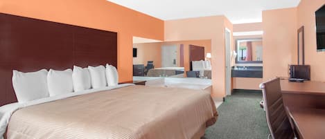 Suite, 1 King Bed, Non Smoking | In-room safe, desk, iron/ironing board, rollaway beds