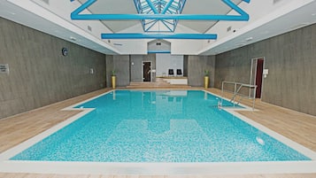 Indoor pool, open 7:00 AM to 9:00 PM, sun loungers