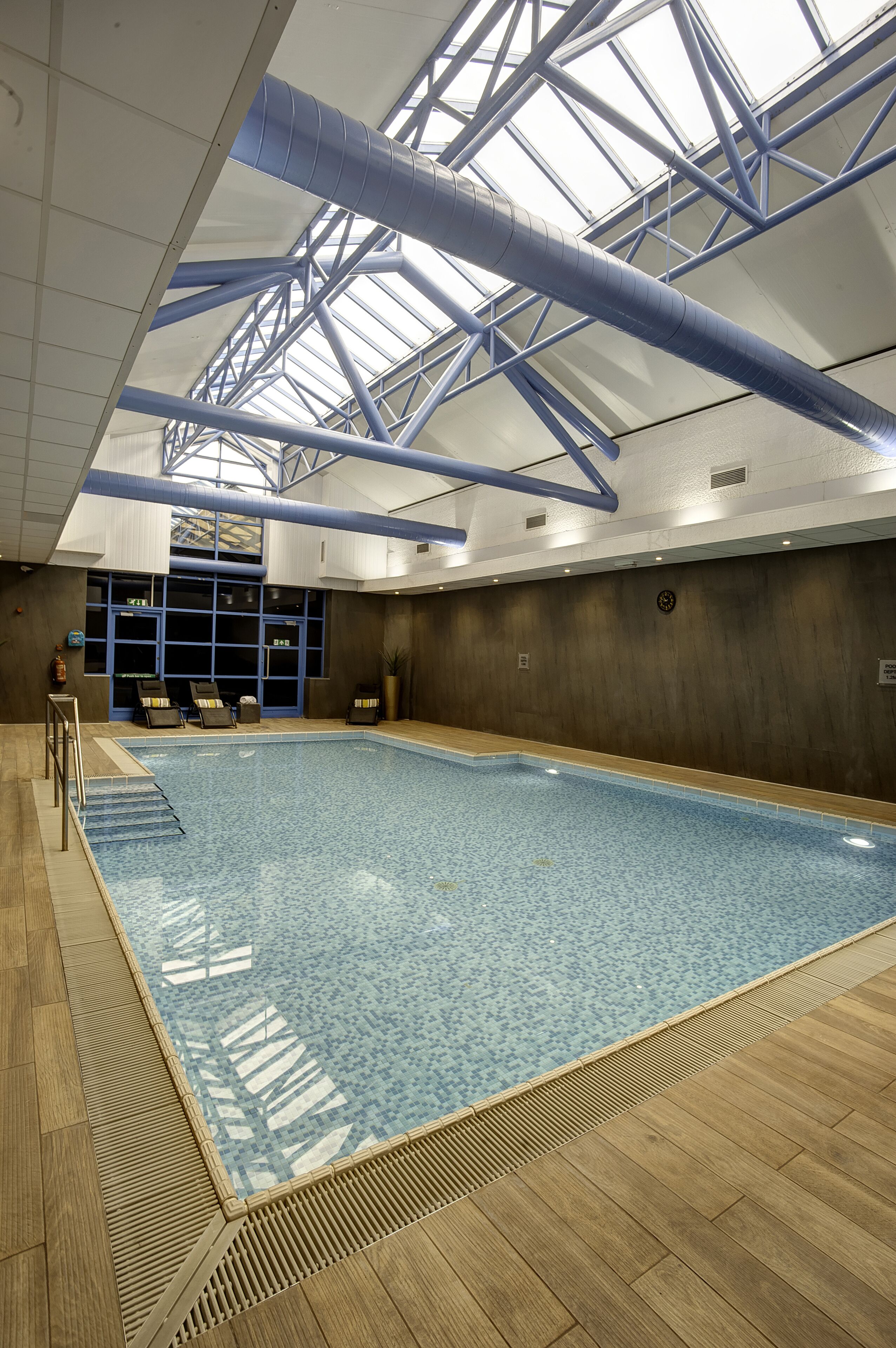 Indoor pool, open 7:00 AM to 9:00 PM, sun loungers
