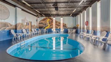 Indoor pool, open 8:00 AM to 10:00 PM, pool loungers