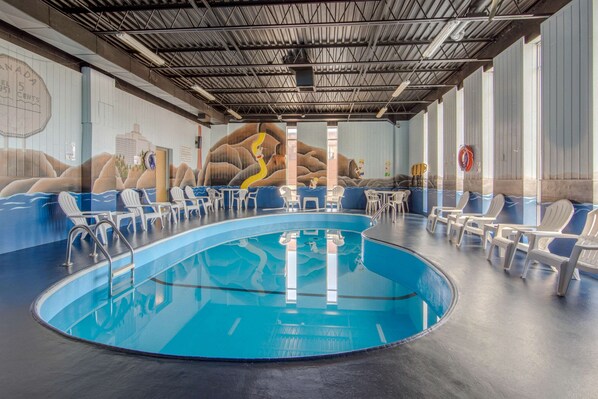 Indoor pool, open 8:00 AM to 10:00 PM, pool loungers