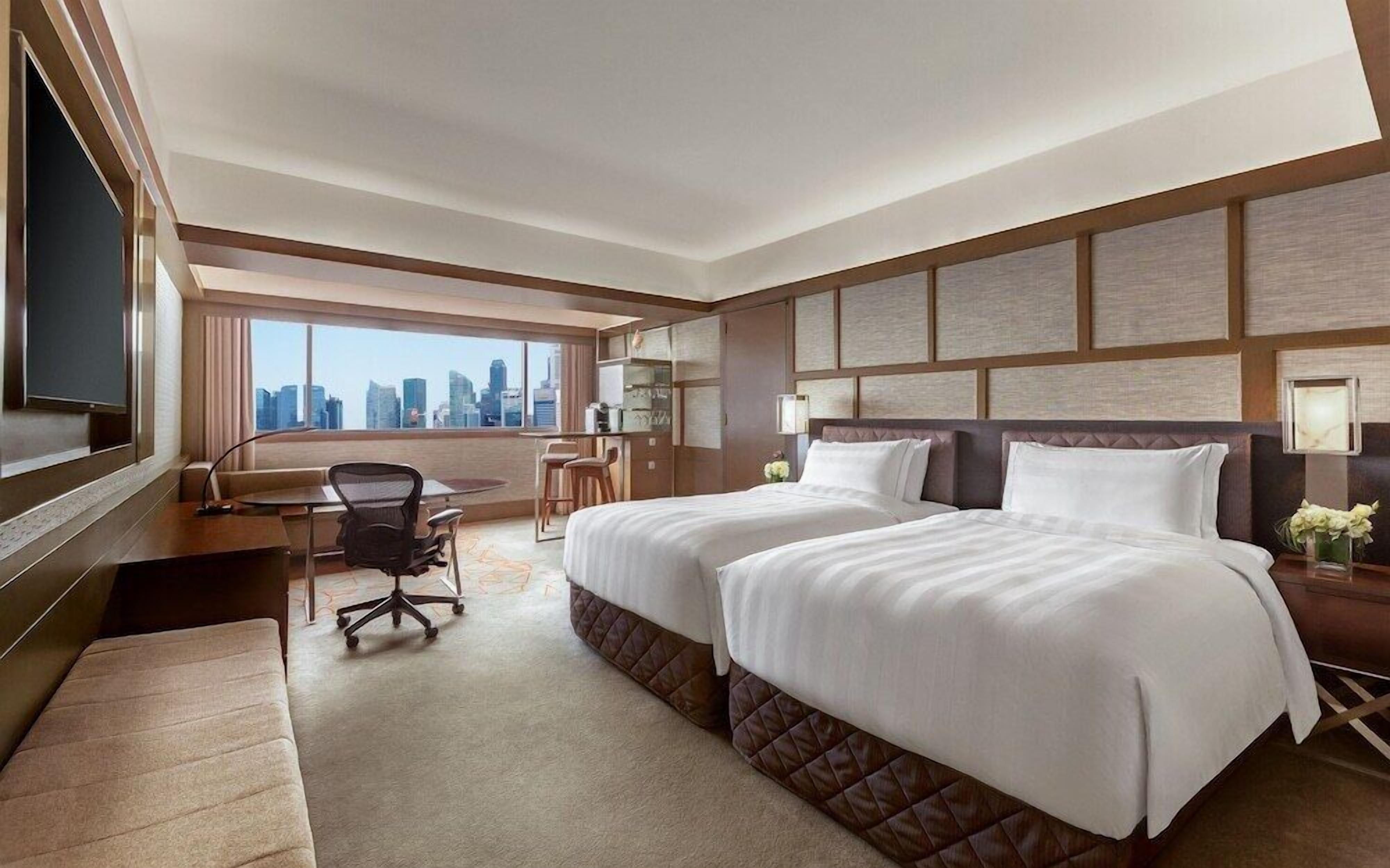 Ropa de cama de alta calidad y minibar 