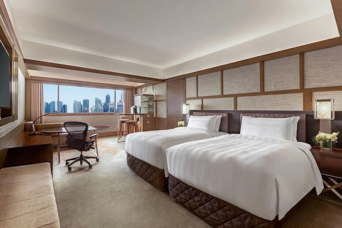 Ropa de cama de alta calidad y minibar