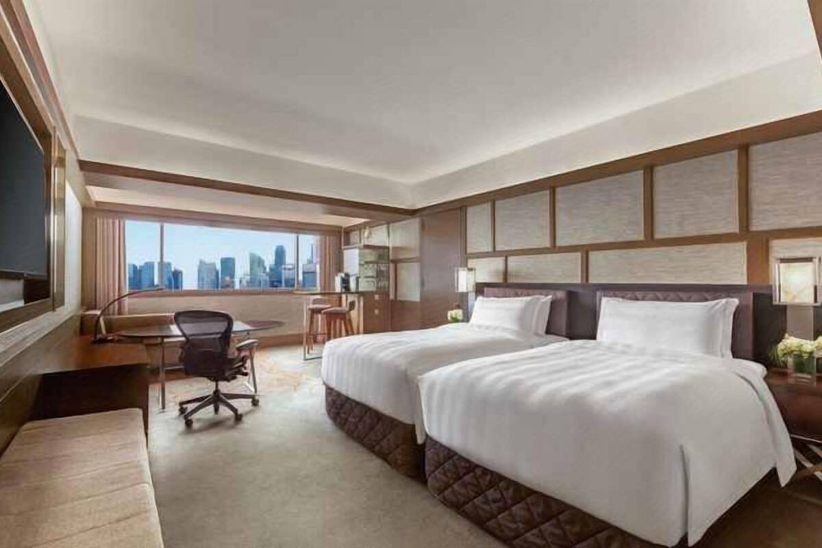 Ropa de cama de alta calidad y minibar 