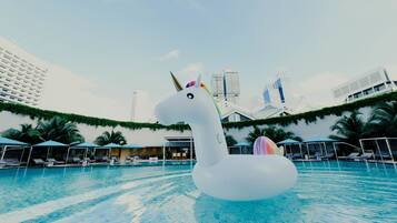 2 outdoor pools, open 7:00 AM to 10:30 PM, pool loungers