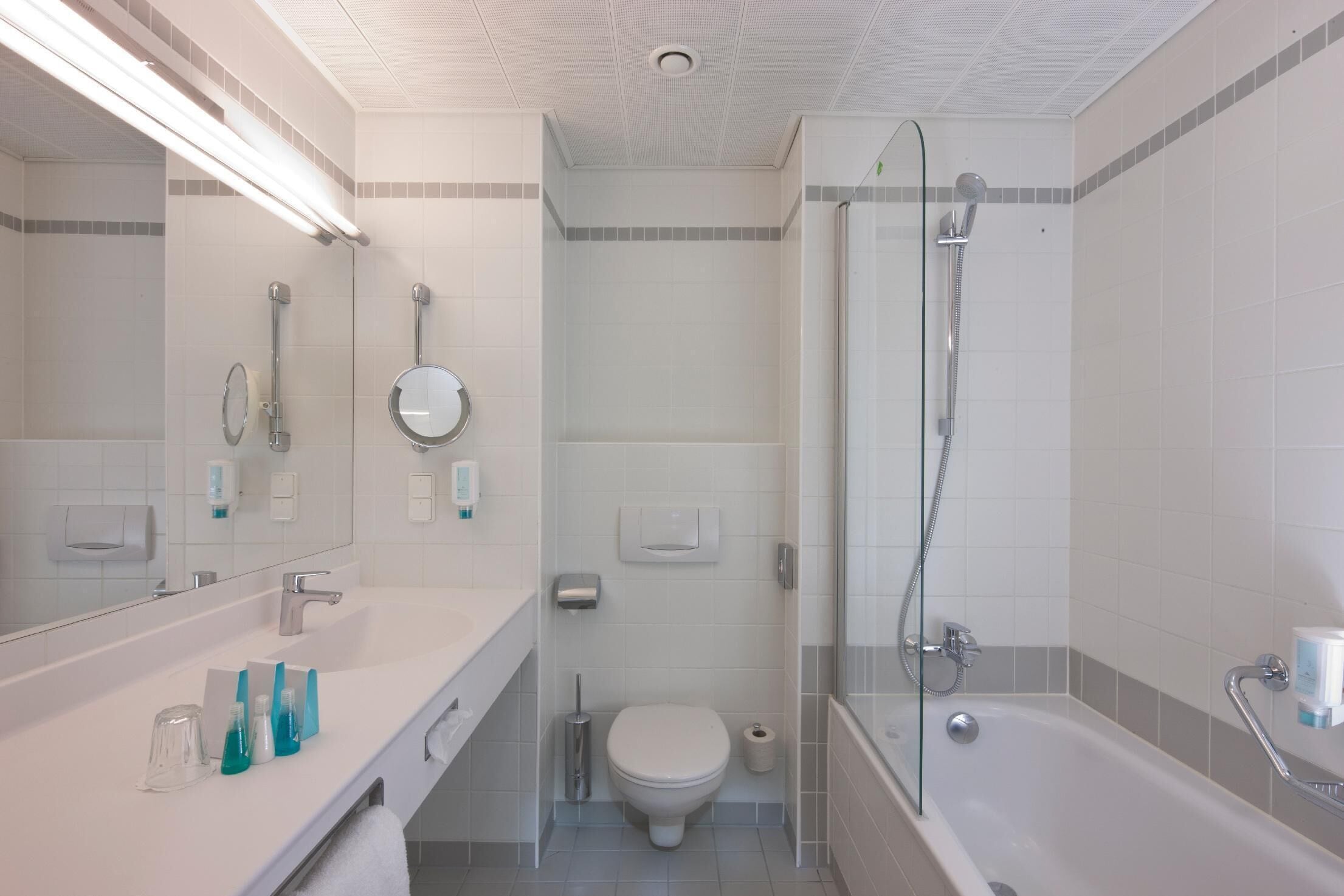 eco-friendly toiletries, hair dryer, towels