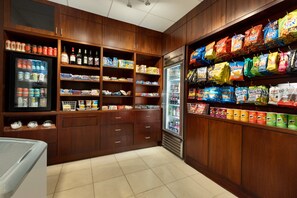 A well-stocked snack and beverage section with various packaged goods and refrigerated items. - Crowne Plaza Crystal City-Washington, D.C. by IHG (Arlington)