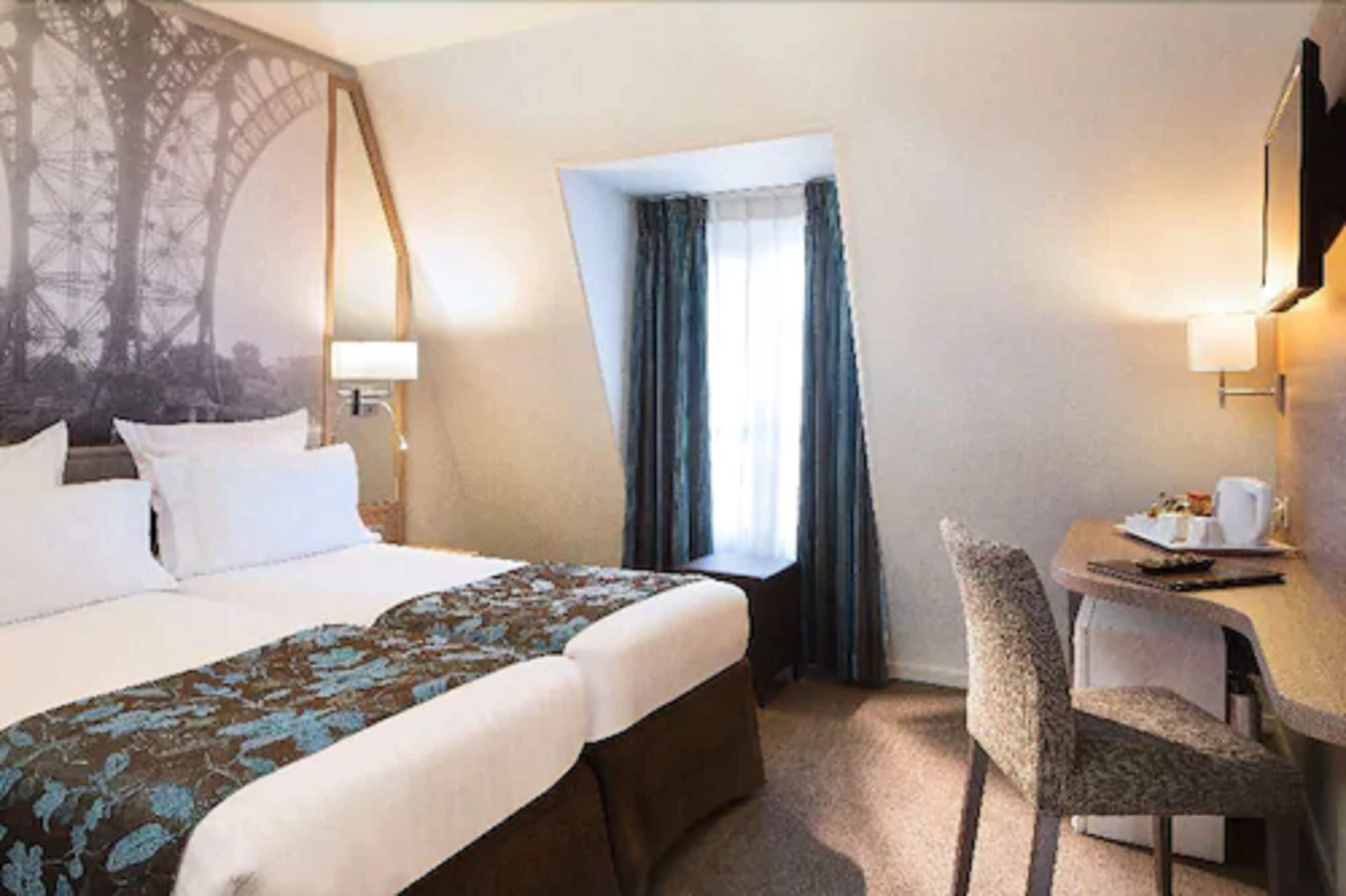 twin room | minibar, in-room safe, desk, blackout curtains