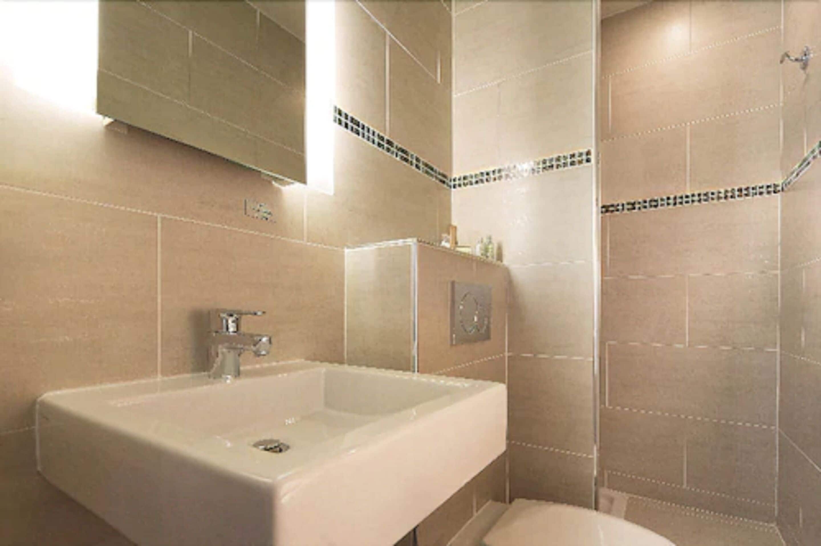 eco-friendly toiletries, hair dryer, dressing gowns, towels