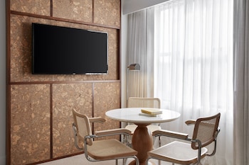 Frette Italian sheets, premium bedding, down comforters, minibar at Lyle Washington D.C.