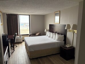 Habitación estándar, 1 cama King size | Escritorio, wifi gratis y ropa de cama 