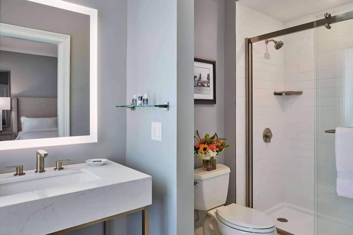 Bathroom | Combined shower/tub, designer toiletries, hair dryer, bathrobes