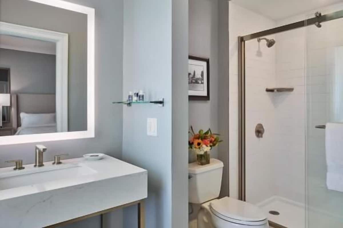 Bathroom | Combined shower/tub, designer toiletries, hair dryer, bathrobes