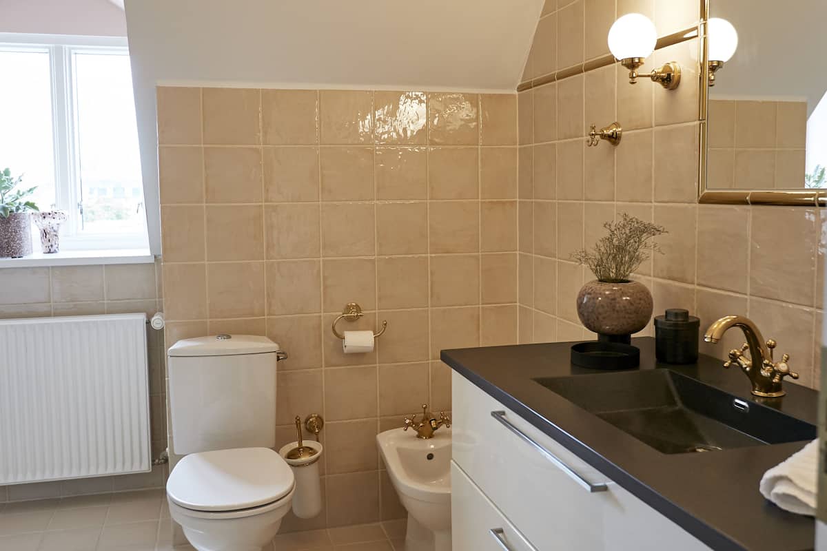 exclusive penthouse, balcony, city view | bathroom | designer toiletries, hair dryer, bathrobes, heated floors