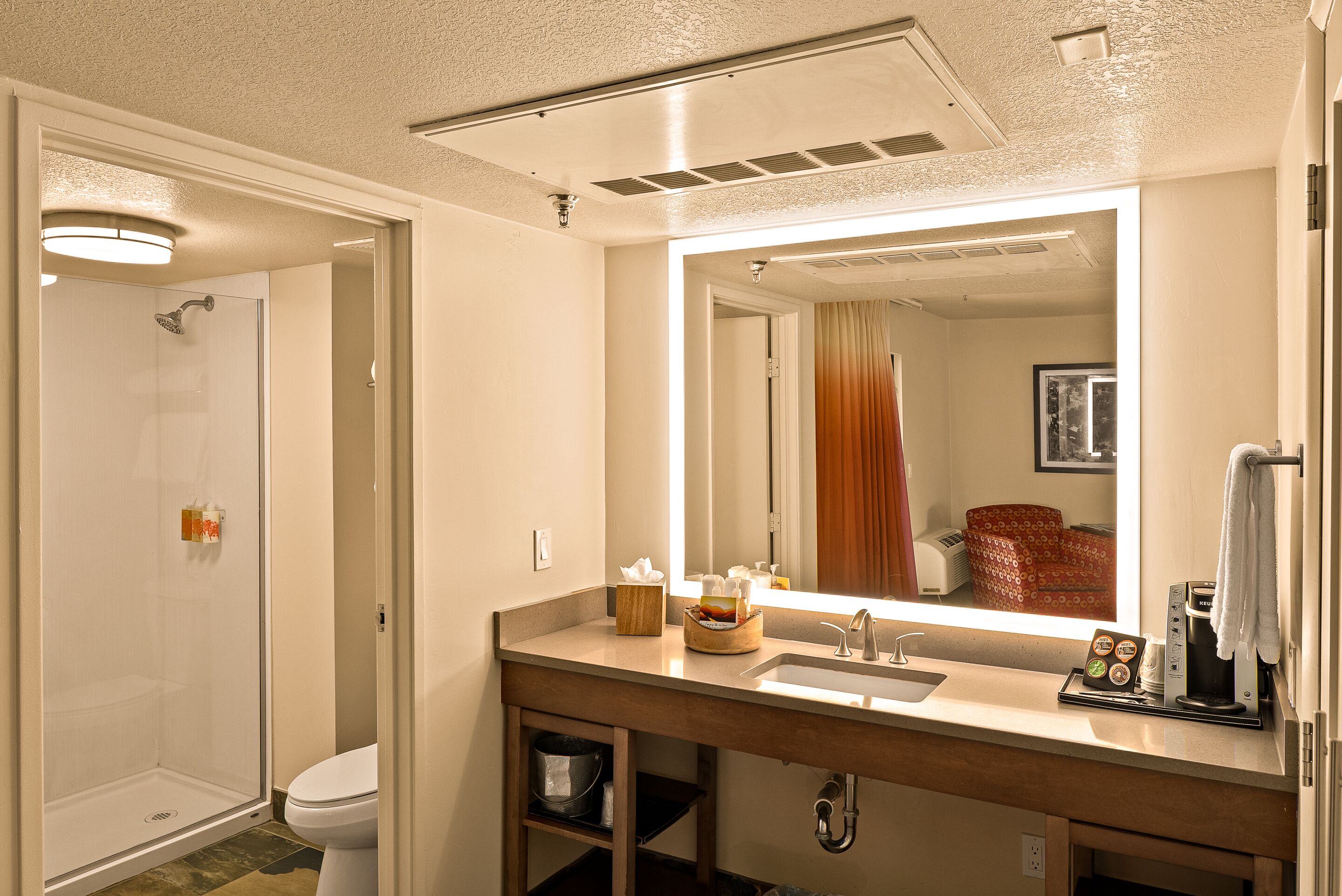 shower, eco-friendly toiletries, hair dryer, towels