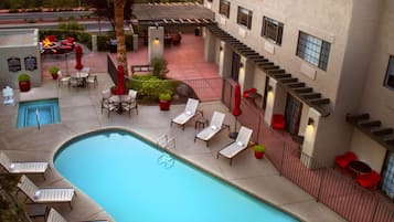 2 outdoor pools, a heated pool, open 7:00 AM to 10:00 PM, pool umbrellas