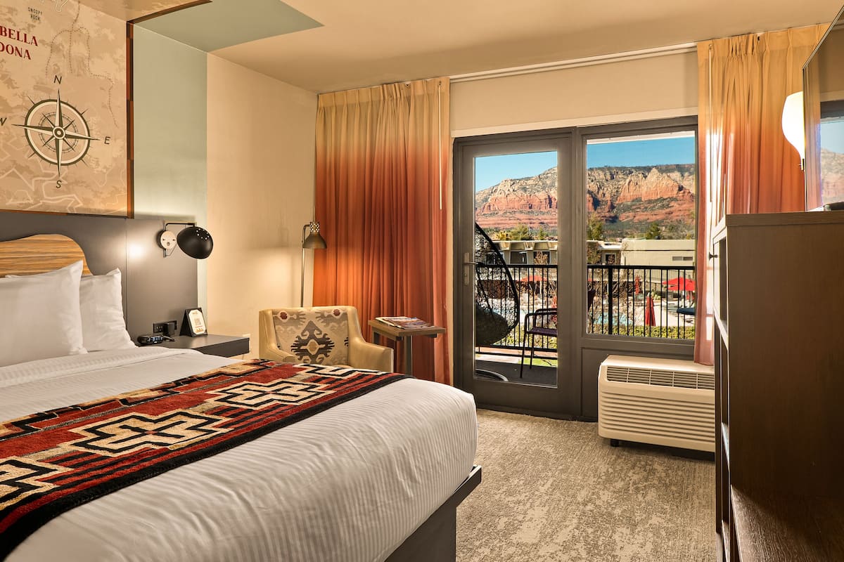 Premium Room, 1 Queen Bed (Courtyard) | Premium bedding, in-room safe, blackout curtains, iron/ironing board