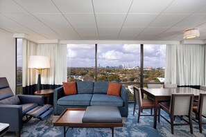 Suite, Multiple Beds, Kitchen | Living area | 55-inch LCD TV with cable channels, TV