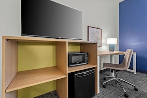 Premium bedding, desk, laptop workspace, iron/ironing board