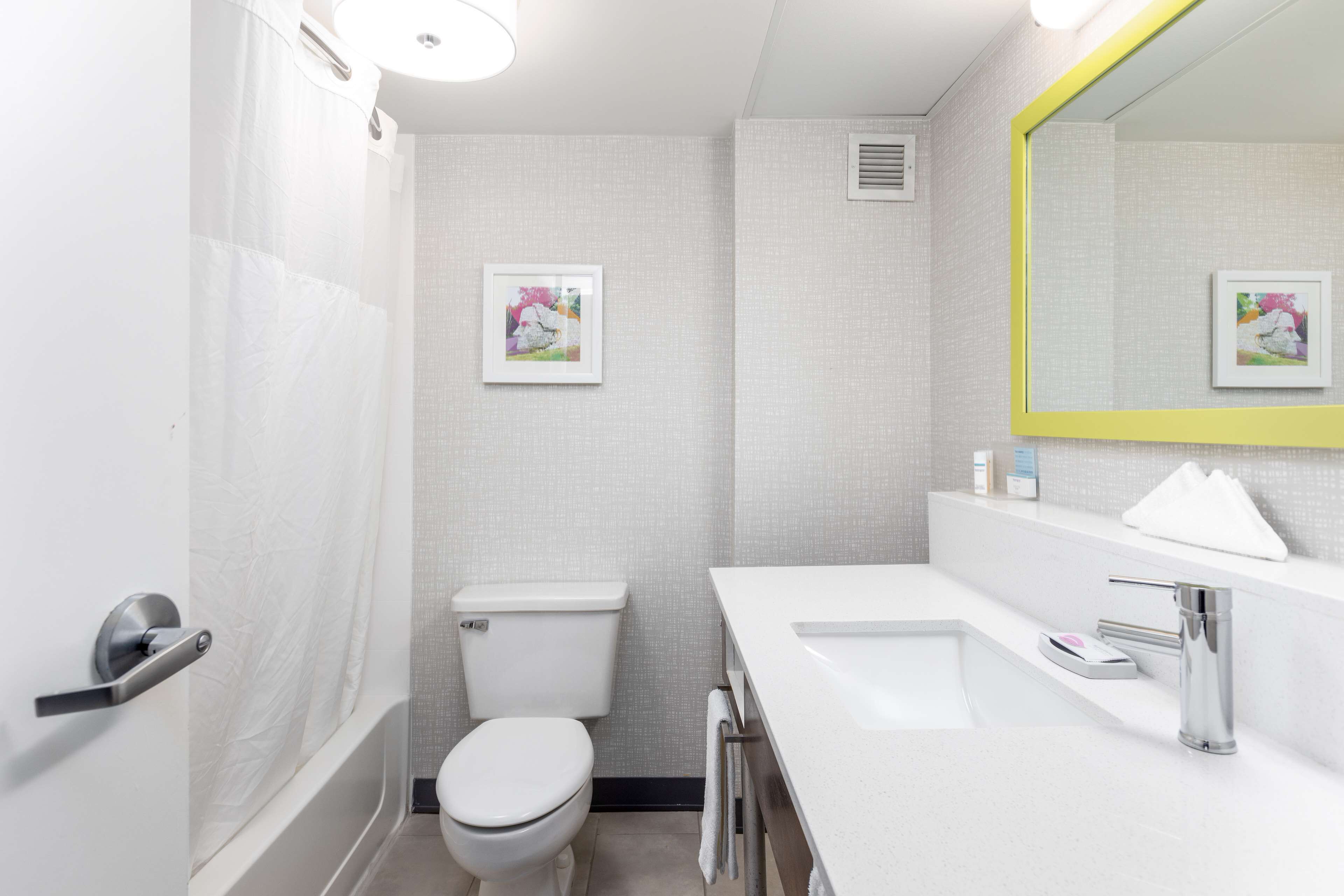 combined shower/bathtub, free toiletries, hair dryer, towels