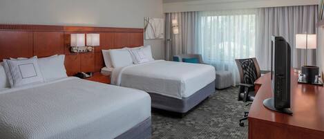 Premium bedding, desk, iron/ironing board, free cots/infant beds