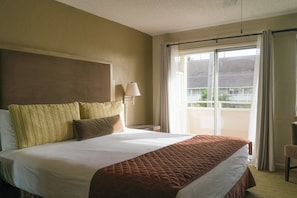 In-room safe, desk, laptop workspace, blackout curtains - Plantation Hale Suites (Kapaa)