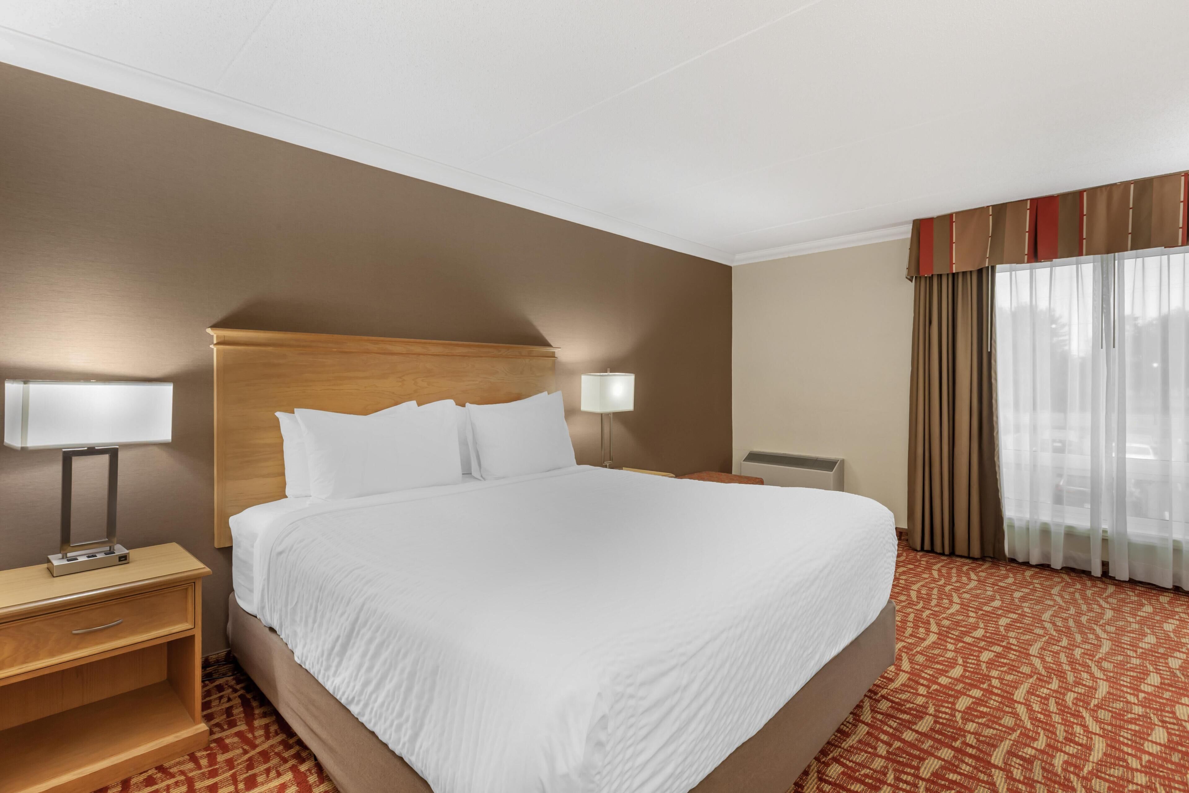 Suite, Multiple Beds, Non Smoking | Premium bedding, in-room safe, desk, laptop workspace