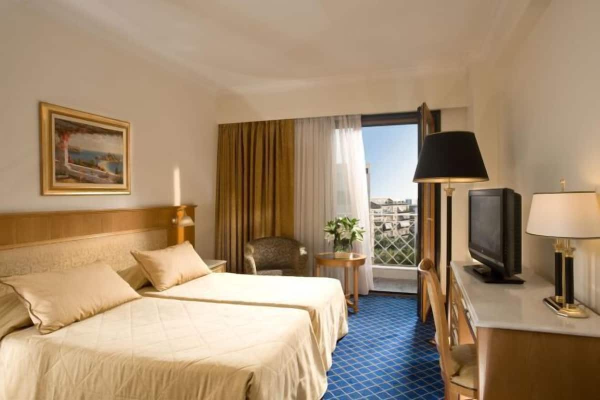 Biancheria da letto di alta qualità, minibar, cassaforte in camera