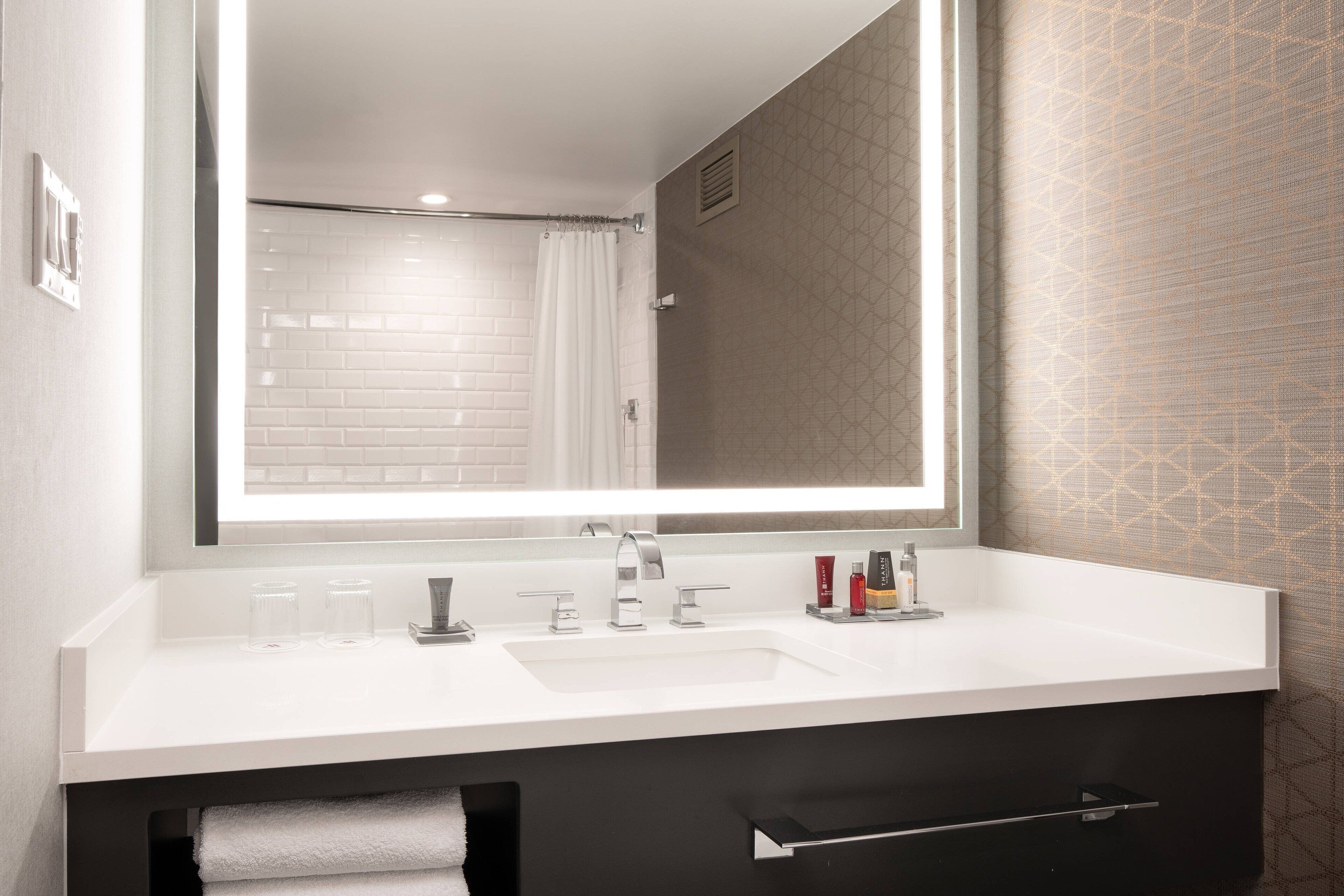 combined shower/bathtub, free toiletries, hair dryer, towels