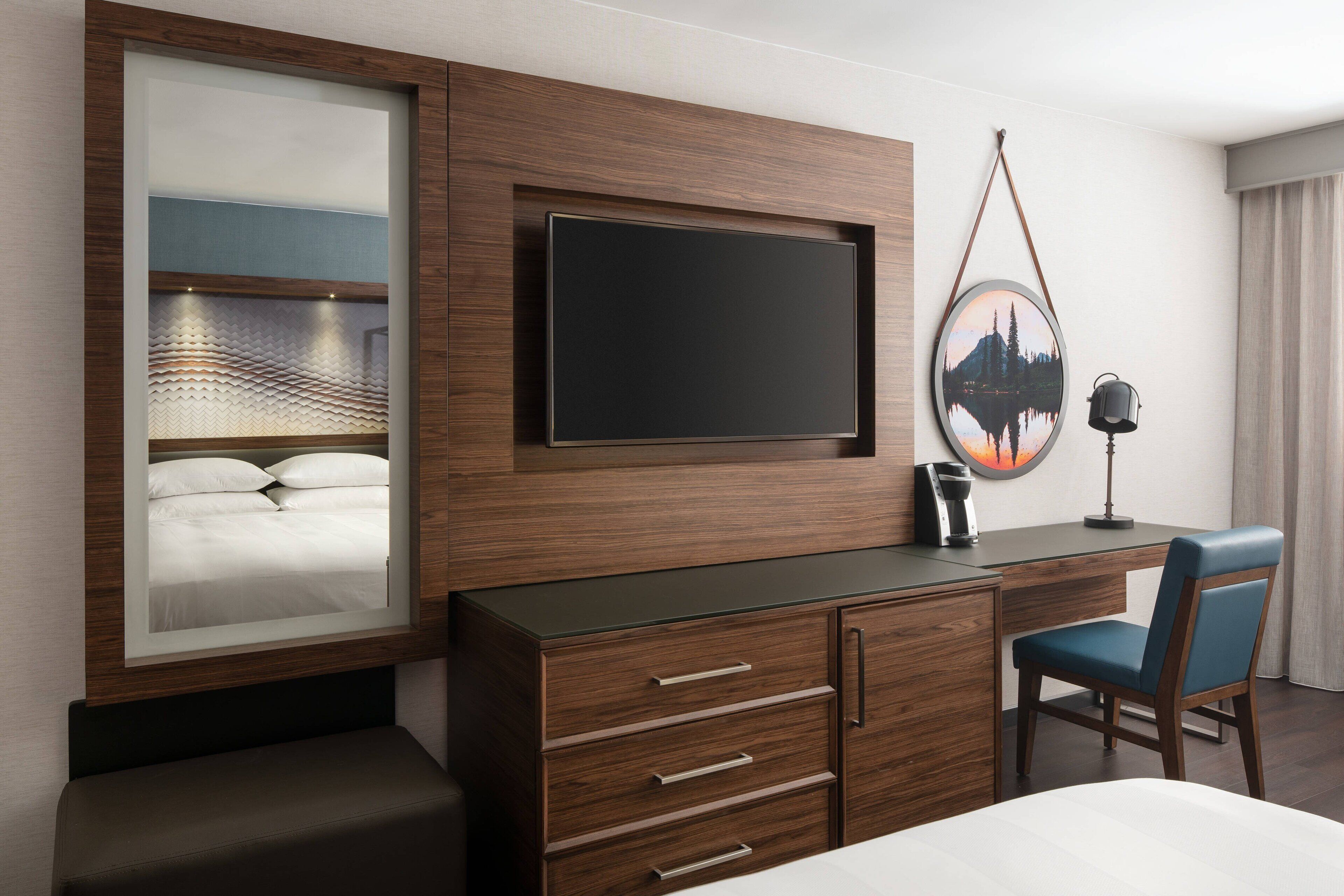 premium bedding, pillow-top beds, desk, laptop workspace