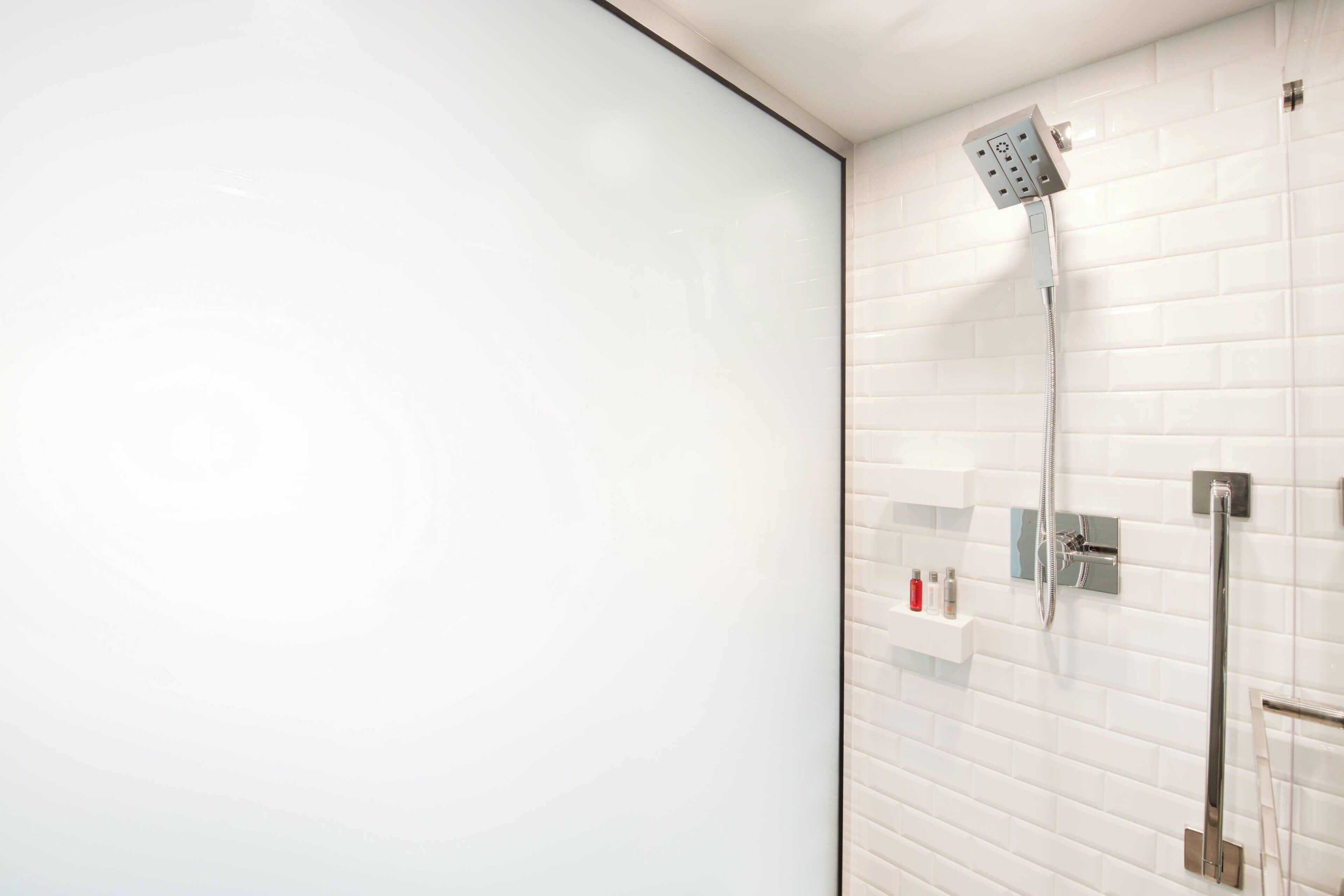 combined shower/bathtub, free toiletries, hair dryer, towels