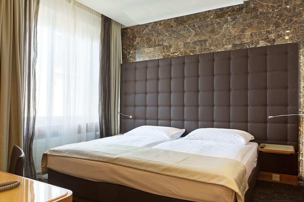1 habitación, minibar y caja de seguridad en la habitación