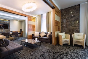 Presidential Suite, 1 Bedroom, Balcony | Living area | Flat-screen TV