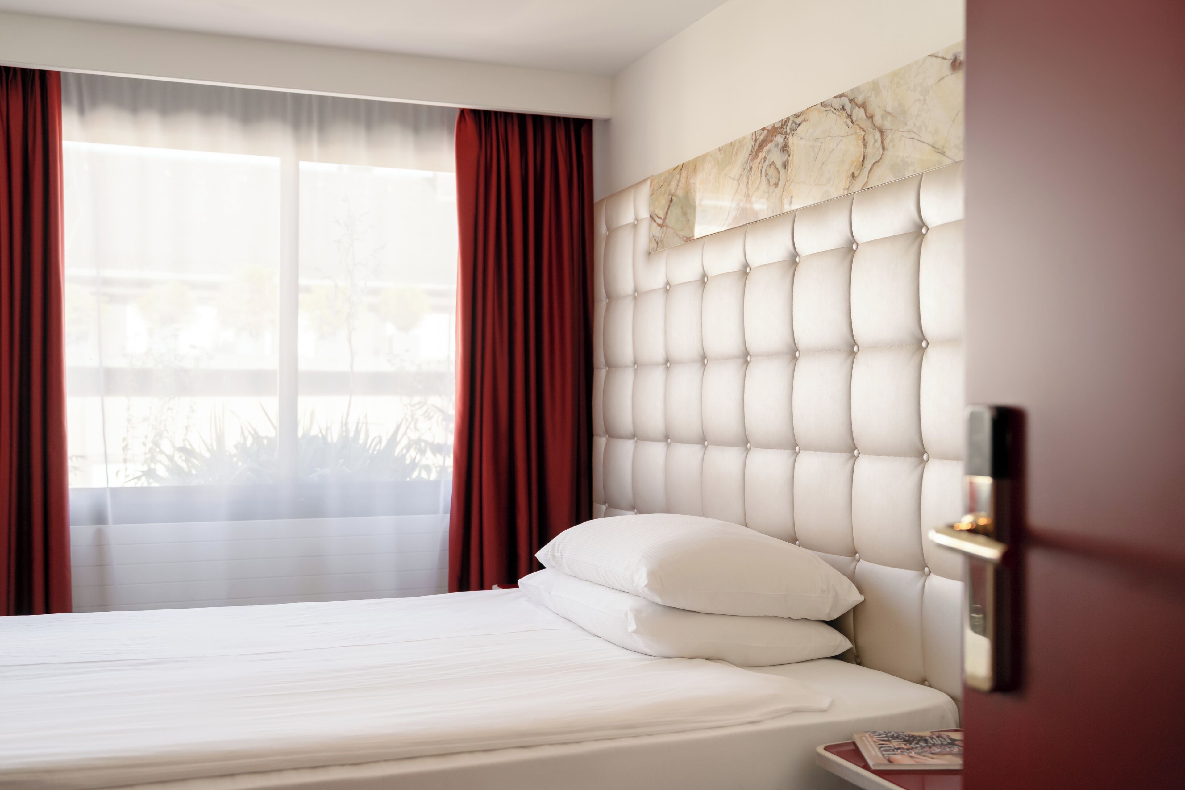 Quarto solteiro standard | Frigobar, cofres nos quartos, quartos à prova de som, Wi-Fi de cortesia