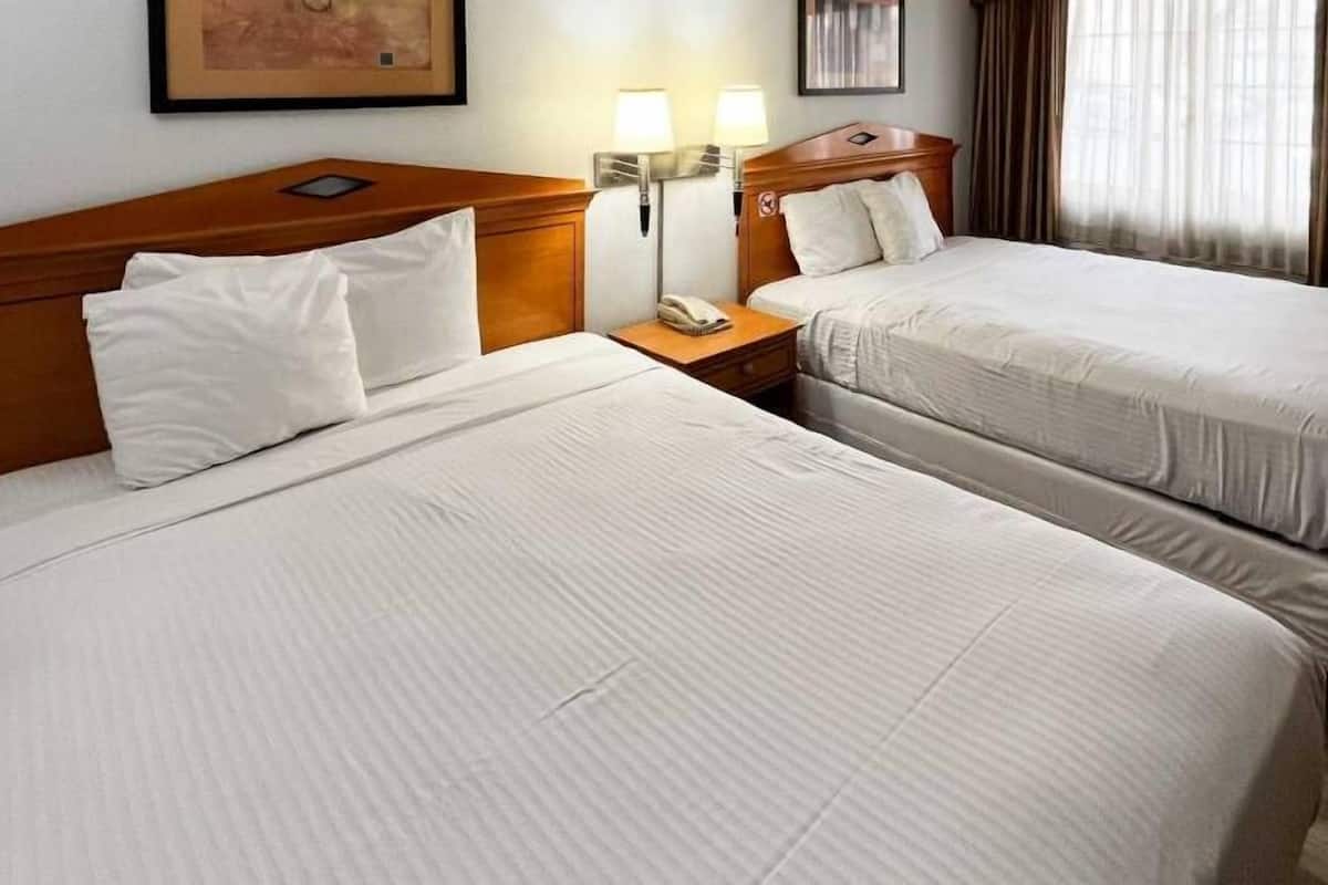 Desk, blackout drapes, free WiFi, bed sheets