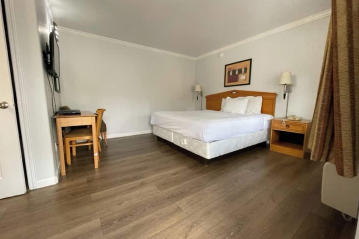 Desk, blackout curtains, free WiFi, bed sheets